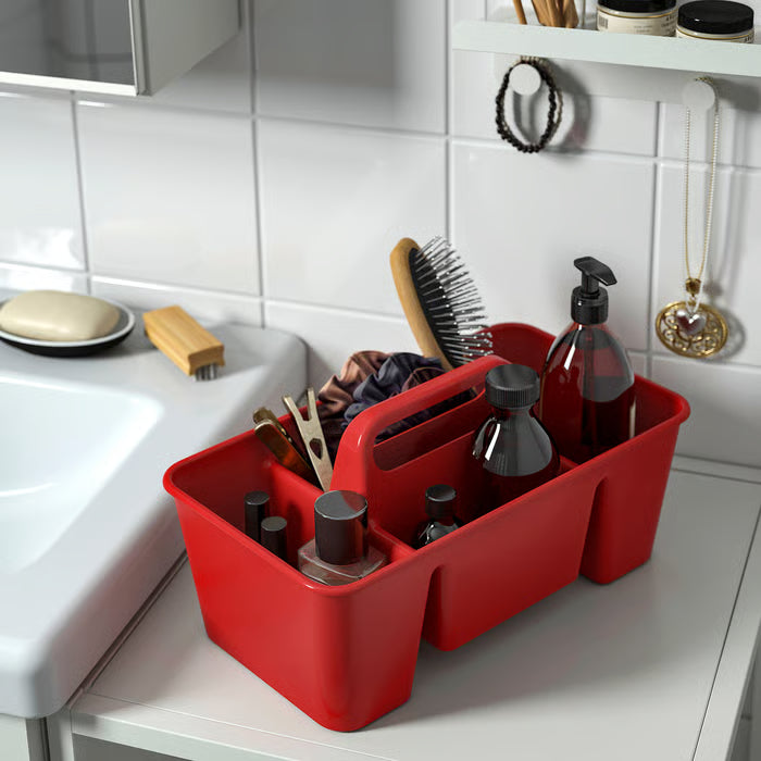 IKEA STACKSTOD red desk organiser placed on bathroom shelf with toiletries