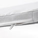 Close-up of IKEA STAGGSTARR light grey chair pad zip and textured polyester fabric detail