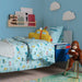 Kids bedroom with blue bed pocket holding books and toys bedside