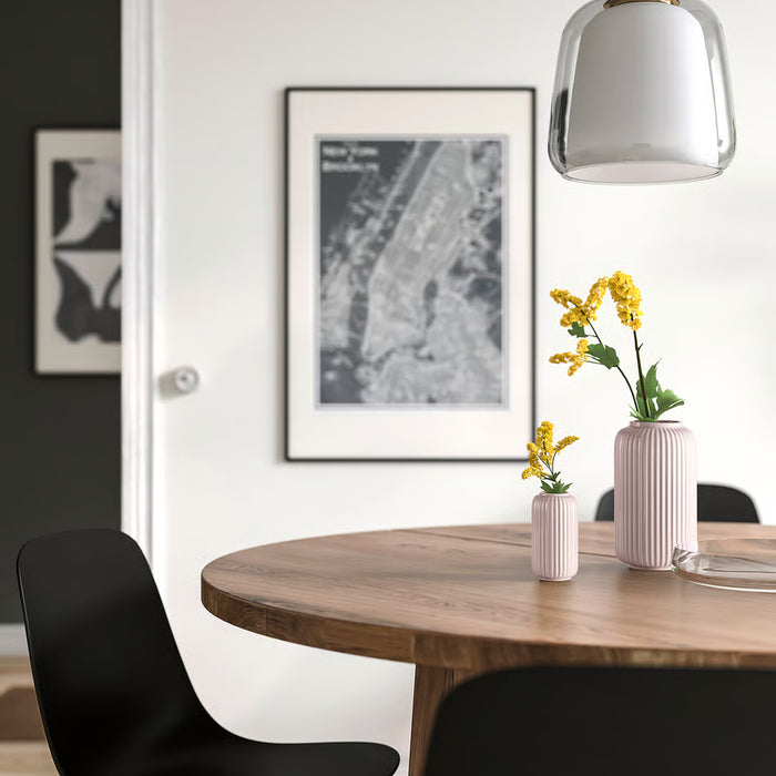 IKEA STILREN pink vases with yellow flowers styled on dining table