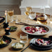 IKEA STOCKHOLM walnut salad servers on rustic table with mixed salad bowl