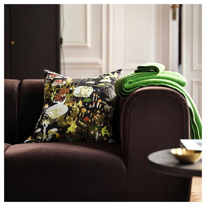 IKEA STOCKHOLM 2025 black multicolour linen cushion cover styled on light grey sofa in living room