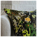 Close-up of IKEA STOCKHOLM 2025 cushion cover showing multicolour nature print detail on black linen