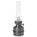 Vintage-style oil lamp with clear glass chimney on a white background