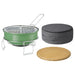 Green portable grill with gray carrying case and wooden lid on a white background