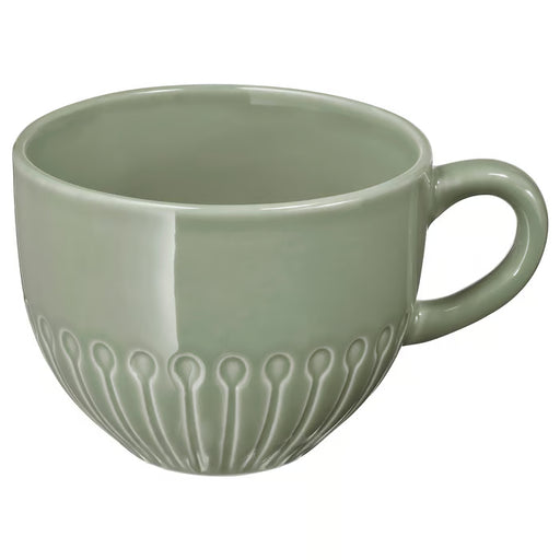 IKEA STRIMMIG pale grey-green mug side profile showing petal texture and smooth glaze finish