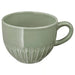 IKEA STRIMMIG pale grey-green mug side profile showing petal texture and smooth glaze finish