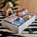 IKEA STUK white black box with three sections holding folded clothes and headbands in drawer