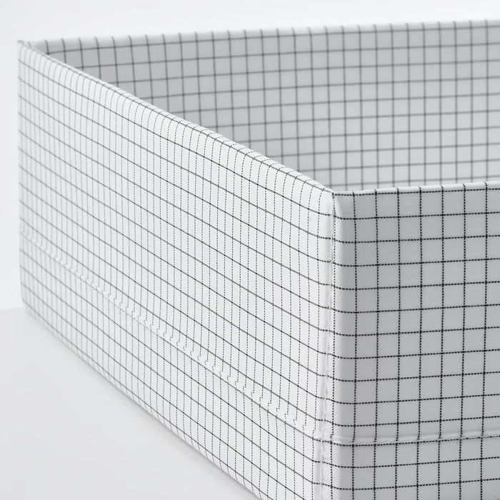  IKEA STUK box with compartments white black top-down view showing two divided sections