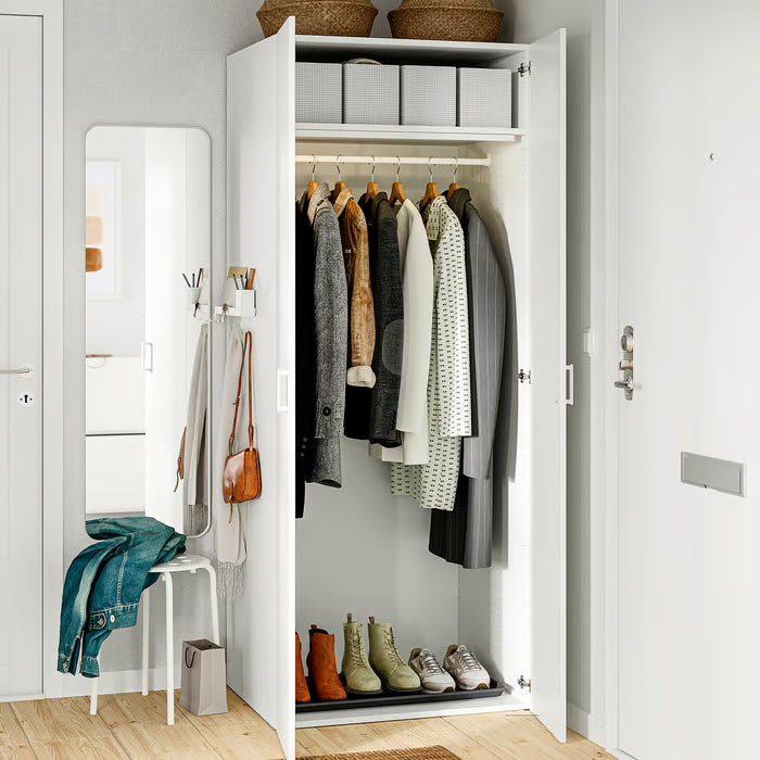  IKEA STUK box with compartments white black inside view showing built-in divider two sections