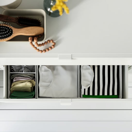 IKEA STUK organiser box white black with zebra-stripe dividers inside wardrobe door compartments
