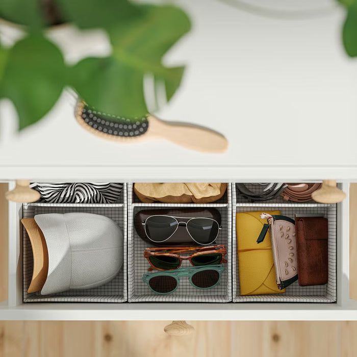 IKEA STUK white black compartment boxes organised with accessories and small items in drawer