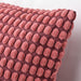 IKEA SVARTPOPPEL cushion cover light red 65x65 cm flat lay product shot