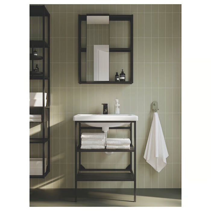  IKEA TACKAN white glass soap dispenser styled in a modern bathroom setting beside sink