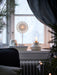IKEA TÄRNABY beige table lamp styled on window sill with decorative accessories warm ambient light