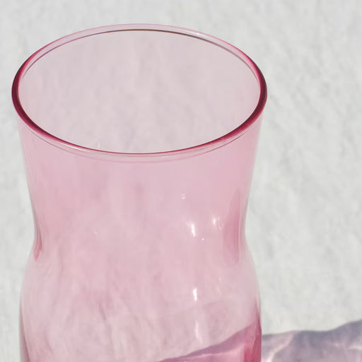 IKEA TIDVATTEN pink vase holding tulips close-up view