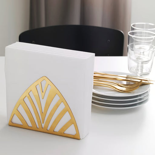  IKEA TILLSTÄLLNING gold napkin holder with white napkins upright on dining table with brass cutlery and glasses