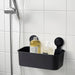 IKEA TISKEN black suction cup basket holding shampoo and soap bottles in shower