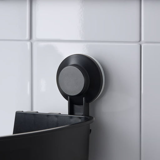 IKEA TISKEN black corner shelf mounted with suction cup on tiled shower wall