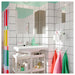  IKEA TISKEN white hook with suction cup close-up showing compact profile and circular base