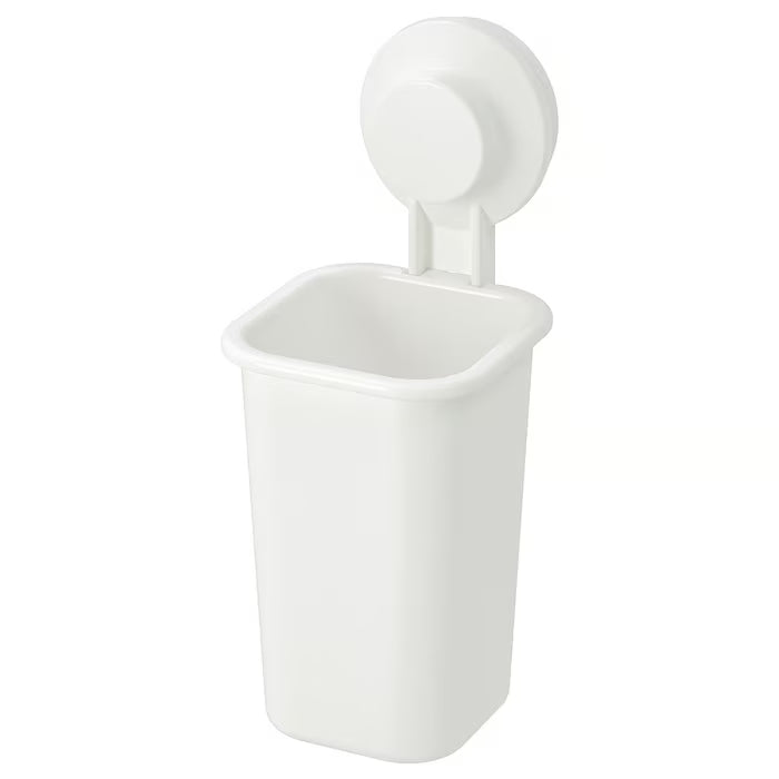  IKEA TISKEN white toothbrush holder with suction cup mounted on bathroom tile wall front view #50381295