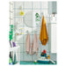  IKEA TISKEN white bathroom organiser with suction cup holding toothbrushes on glass shower panel