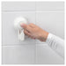  IKEA TISKEN white towel rack flat-lay with packaging showing components and suction cups