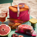IKEA TOFSAND cooling bag pink orange side profile showing carry handle and zip closure