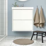 IKEA TOFTBO beige round bath mat 55cm diameter shown from above on bathroom floor