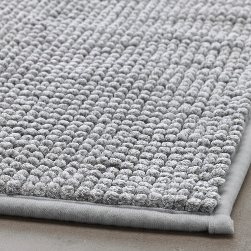 Close-up of IKEA TOFTBO soft textured bath mat showing plush quick-drying microfibre and durable edging