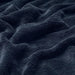 Close-up of TRATTVIVA bedspread in black-blue, 150x250 cm, showcasing its soft texture 10584445