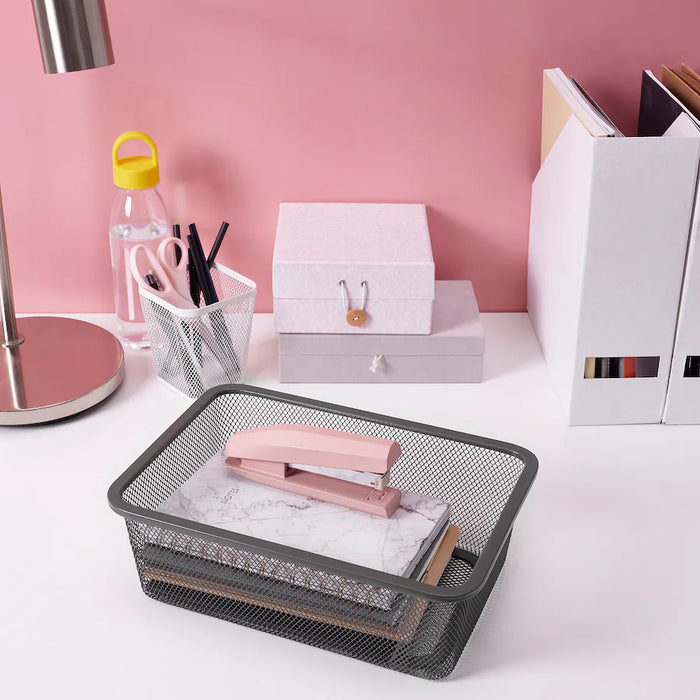 Rectangular dark grey mesh storage bin from IKEA TROFAST, made for organizing toys and small items."