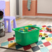 IKEA TROFAST bright green storage box in kids room with building blocks toys and TROFAST frame system