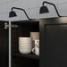 Illuminate your space with IKEA's black cabinet lighting