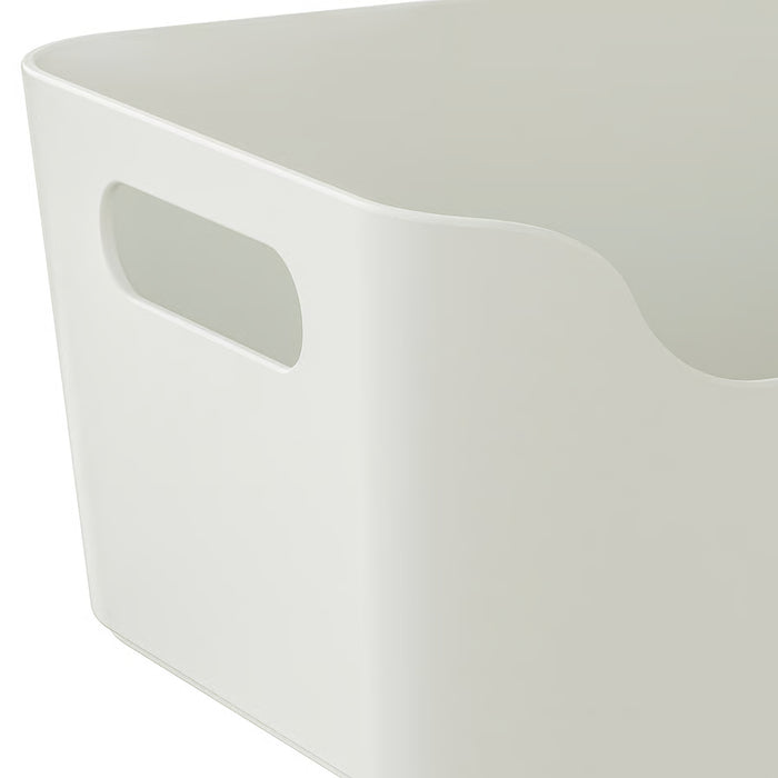 Close-up of IKEA UPPDATERA white storage box showing smooth easy-clean surface and grip handles