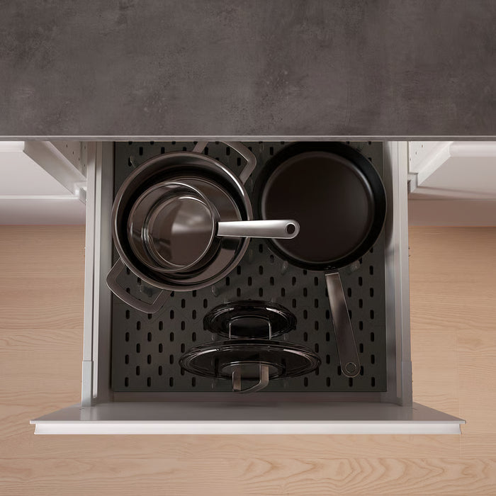  IKEA UPPDATERA black pegboard drawer organisers holding pots and pans in deep kitchen drawer