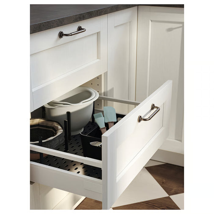 IKEA UPPDATERA anthracite organiser with plates standing upright in a light kitchen setting

