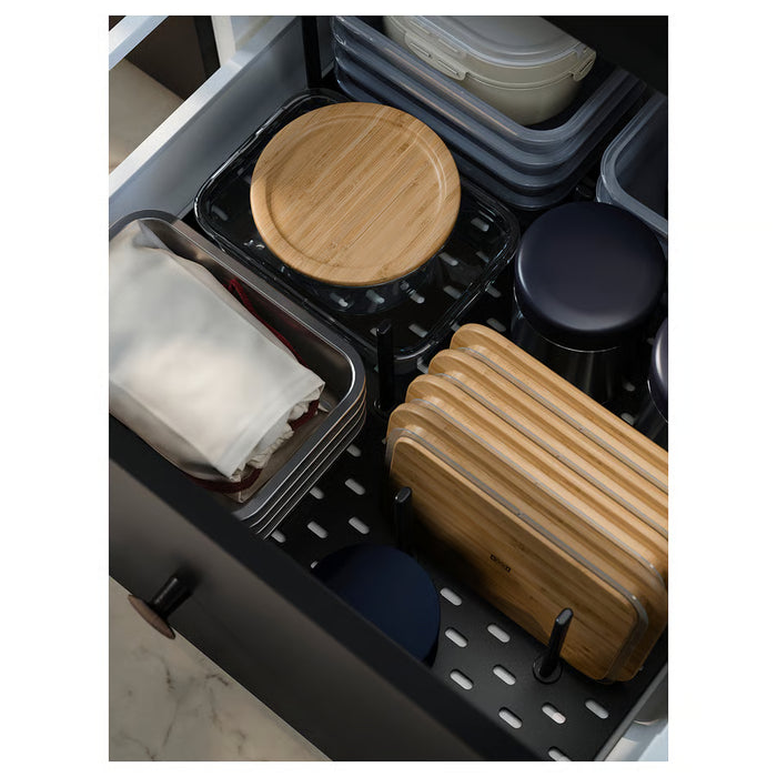  IKEA UPPDATERA pegboard drawer organiser installed in a deep kitchen pull-out with lids and containers