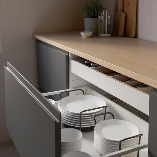 IKEA UPPDATERA anthracite plate holder organising white plates inside an open kitchen drawer