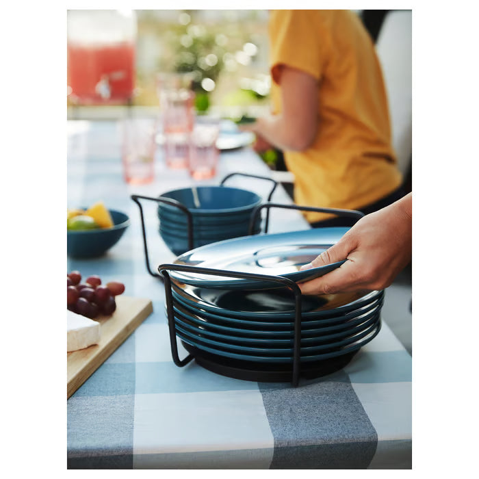 Carrying IKEA UPPDATERA plate holder with plates to dining table