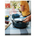Carrying IKEA UPPDATERA plate holder with plates to dining table