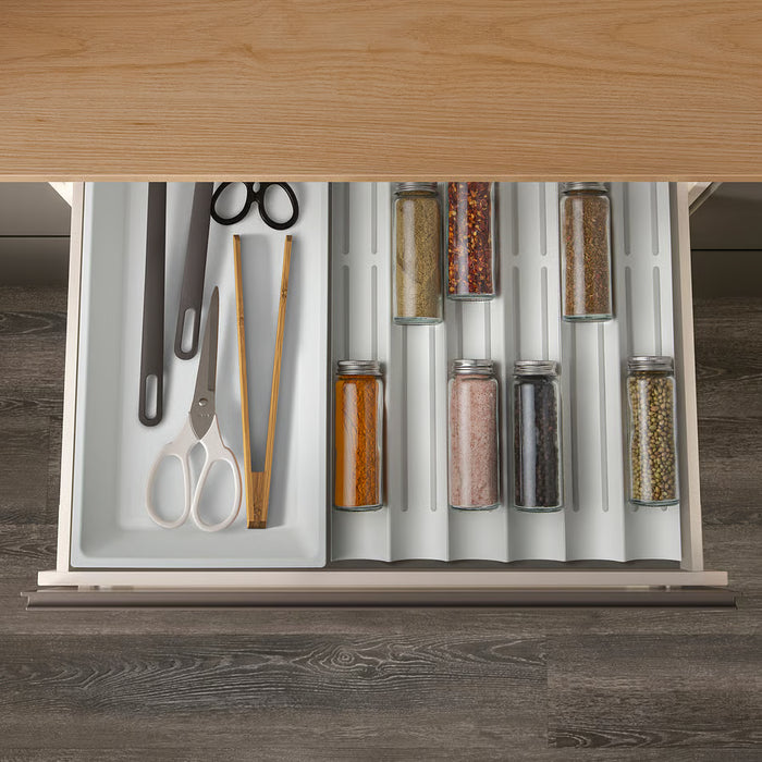 IKEA UPPDATERA spice rack in wooden drawer with spice jars on one side and scissors and chopsticks on the other