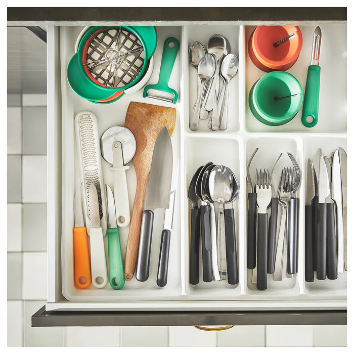 IKEA UPPFYLLD fruit slicer set nested together for compact storage in a kitchen drawer