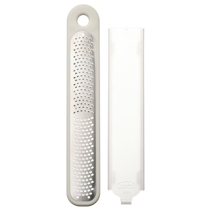 IKEA UPPFYLLD handheld grater off-white with stainless steel blade and plastic protector #50521936