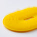 IKEA UPPFYLLD bright yellow vegetable scrubber side view showing flexible textured grip and scrubbing surface
