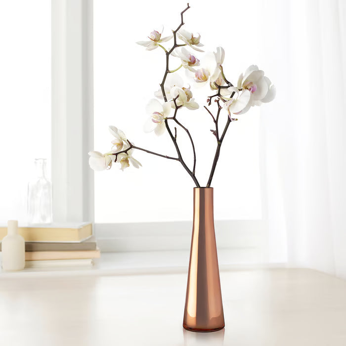 IKEA UPPGJORD copper colour vase 21cm styled with white orchids on a reflective surface