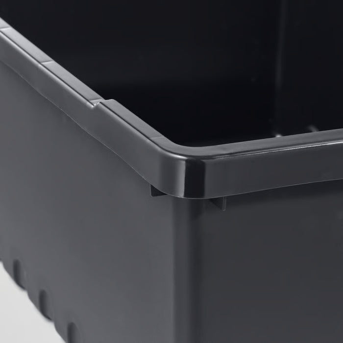  IKEA UPPSNOFSAD black plastic storage box close-up of reinforced rim and corner legs