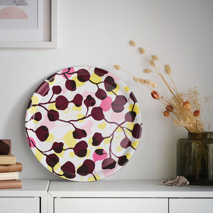 IKEA VÄDERFISK multicolour tray leaned decoratively against kitchen tiling on a counter