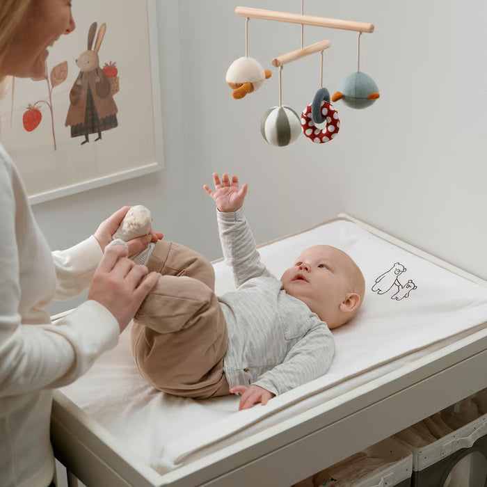 Close-up of IKEA VÄDRA babycare mat cover showing GOTS organic cotton terry fabric detail