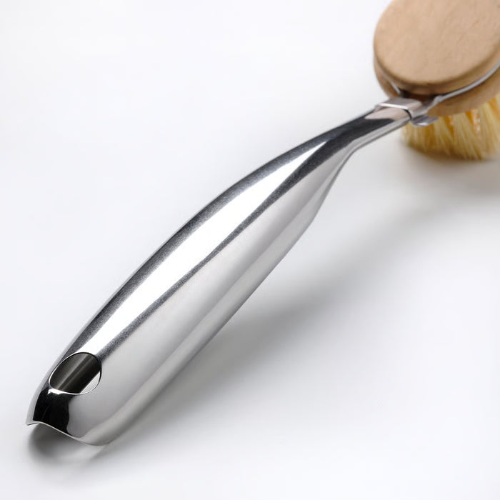 Close-up of IKEA VÄLVÅRDAD dish brush round head with natural agave leaf fibre bristles and wooden handle